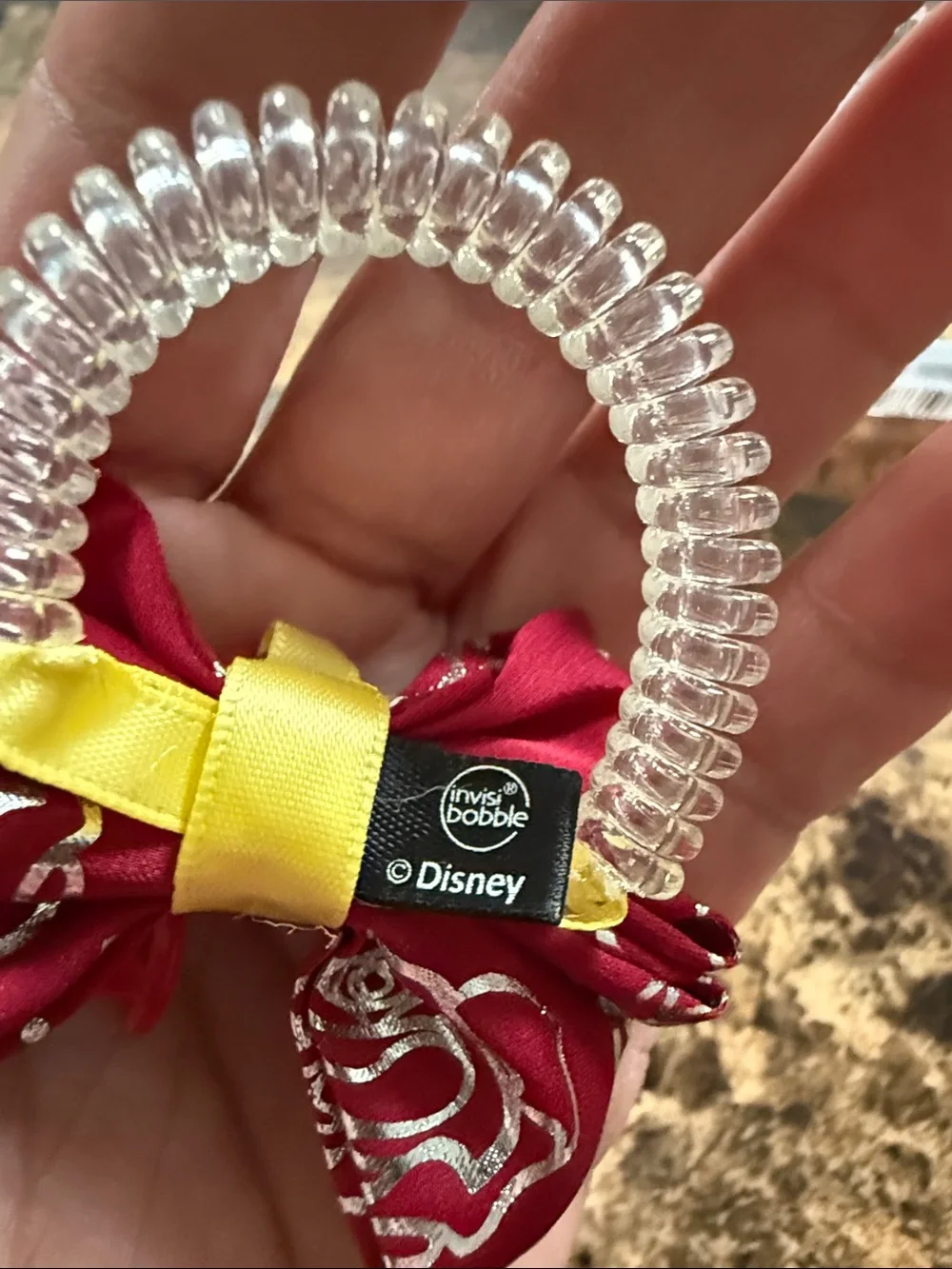 Disney burgundy bow hair ring with yellow and red rose charm
